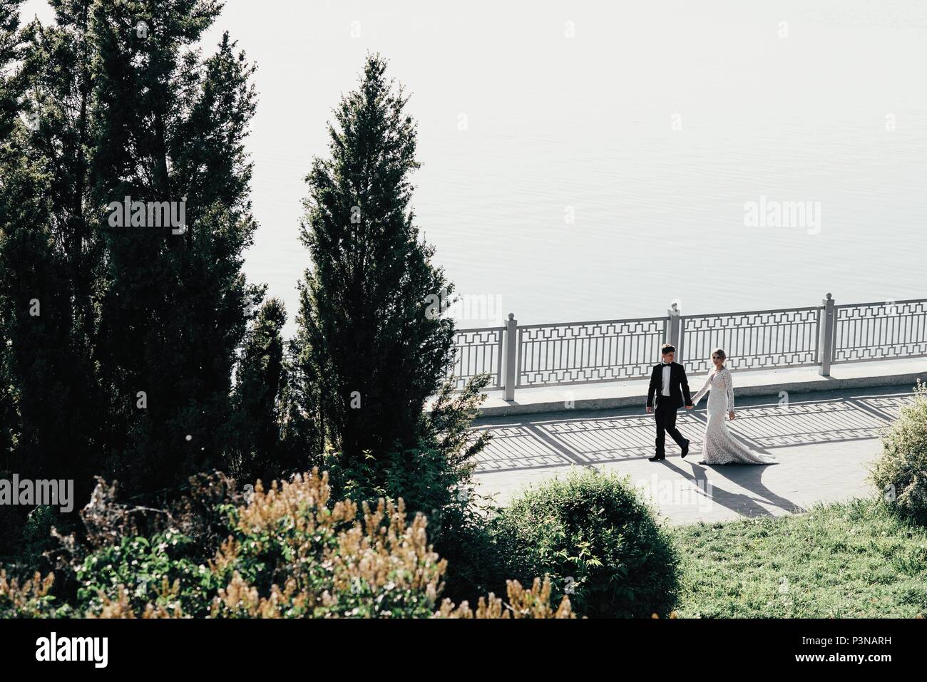 Bride groom walking around city hi-res stock photography and images - Alamy