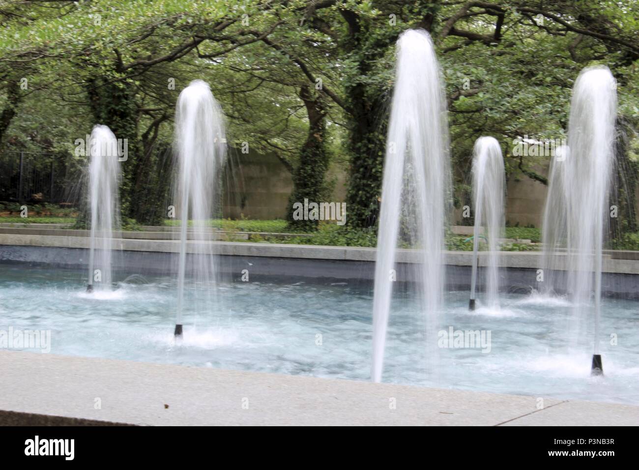 A calming fountain located in the heart of the city Stock Photo