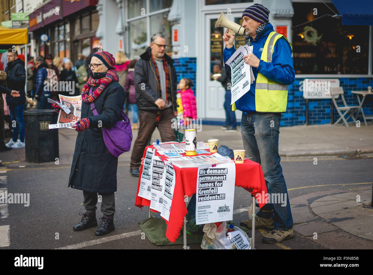 London, UK - December 2017. Protesters pro Grenfell Tower's victims in Portobello Road in Notting Hill. Stock Photo