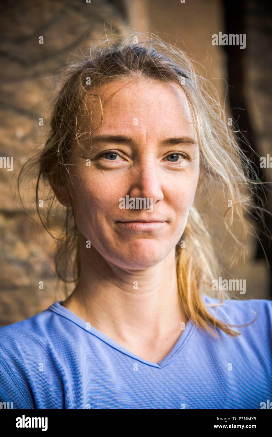 Portrait of a middle aged woman outside in front of a rock wall, Vantage, Washington, USA. Stock Photo