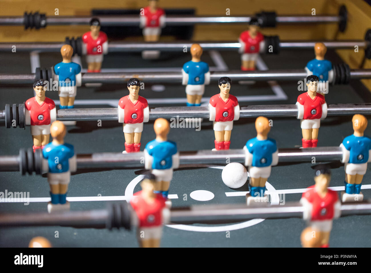 Table football kicker with miniature players Stock Photo Alamy