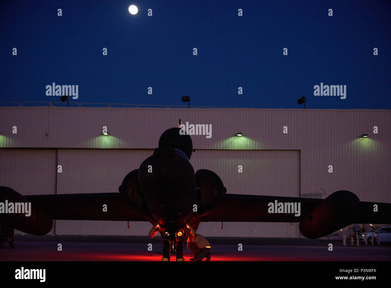 An Airman prepares a Lockheed U-2S Dragon Lady for takeoff while the ...