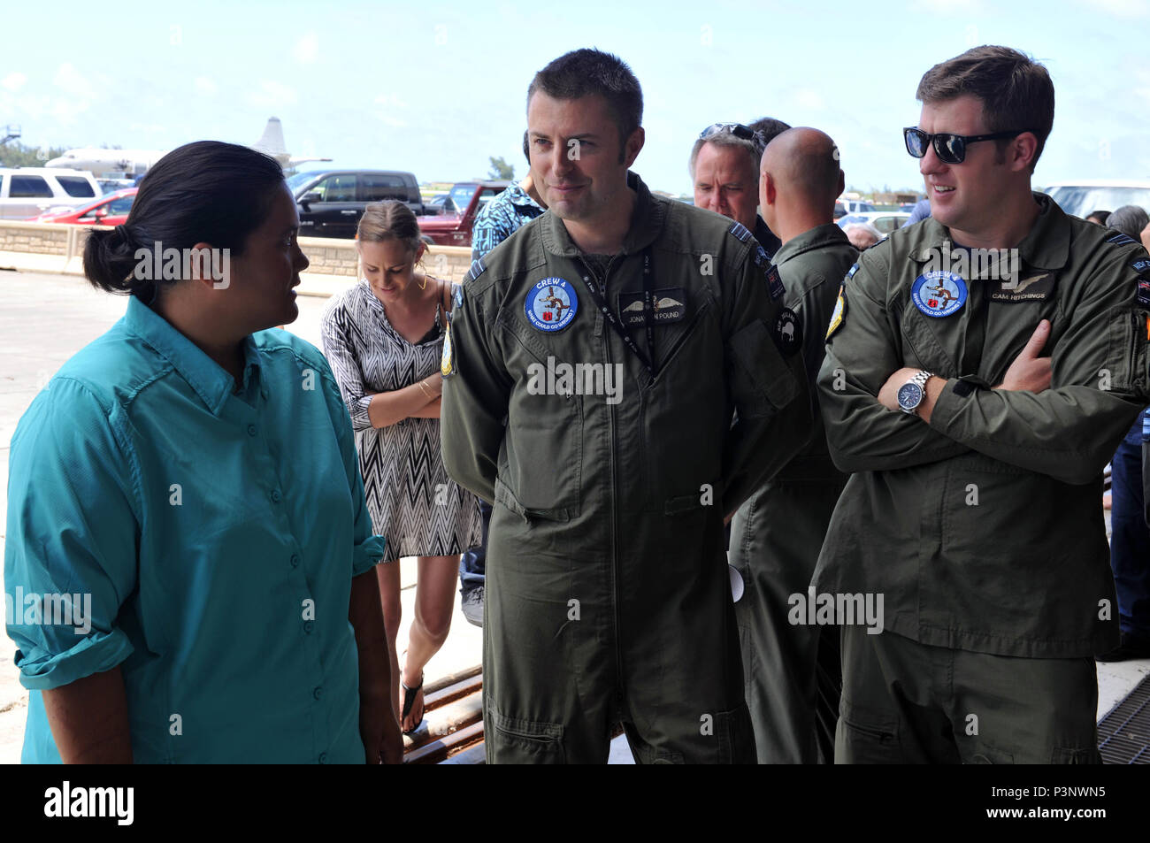 160720-N-ON468-163 MARINE CORPS BASE HAWAII (July 20, 2016) Sydnie Uemoto meets with service members from the Royal New Zealand Air Force No. 5 Air Squadron at Marine Corps Base Hawaii during Rim of the Pacific 2016. Sydnie and her friend David McMahon were involved in a small plane crash nine miles off the coast of the island of Kona, Hawaii July 15, and were rescued by a Coast Guard MH-65 Dolphin helicopter crew following an expansive joint search by U.S. Navy, Royal New Zealand Air Force, U.S. Air Force and Coast Guard crews after a 20-hour search. Twenty-six nations, more than 40 ships and Stock Photo