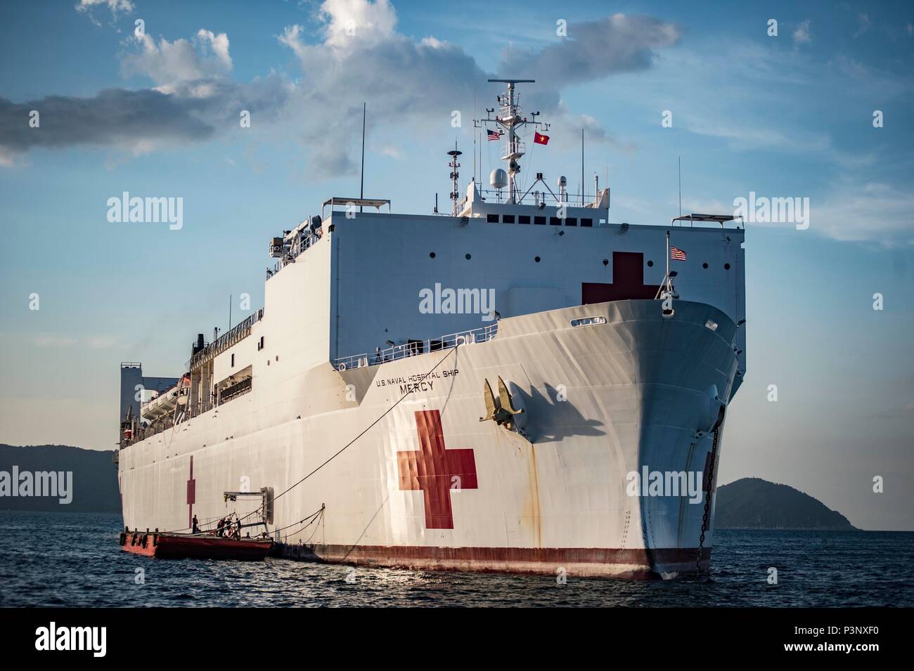 160719-N-QW941-650 DA NANG, Vietnam (July 19, 2016) Hospital ship USNS Mercy (T-AH 19) sits anchored off the coast of Da Nang, Vietnam during its third mission stop of Pacific Partnership 2016. Mercy is joined in Da Nang by JS Shimokita (LST-4002) and Vietnam People's Navy ship Khánh Hóa for Pacific Partnership. Partner nations will work side-by-side with local organizations to conduct cooperative health engagements, community relation events and subject matter expert exchanges to better prepare for natural disaster or crisis. (U.S. Navy photo by Mass Communication Specialist 3rd Class Trevor  Stock Photo