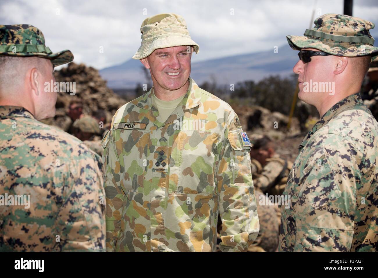 Australian Army officer Brigadier Christopher Field (centre), CSC,  Commander of 3rd Brigade, talks with United States