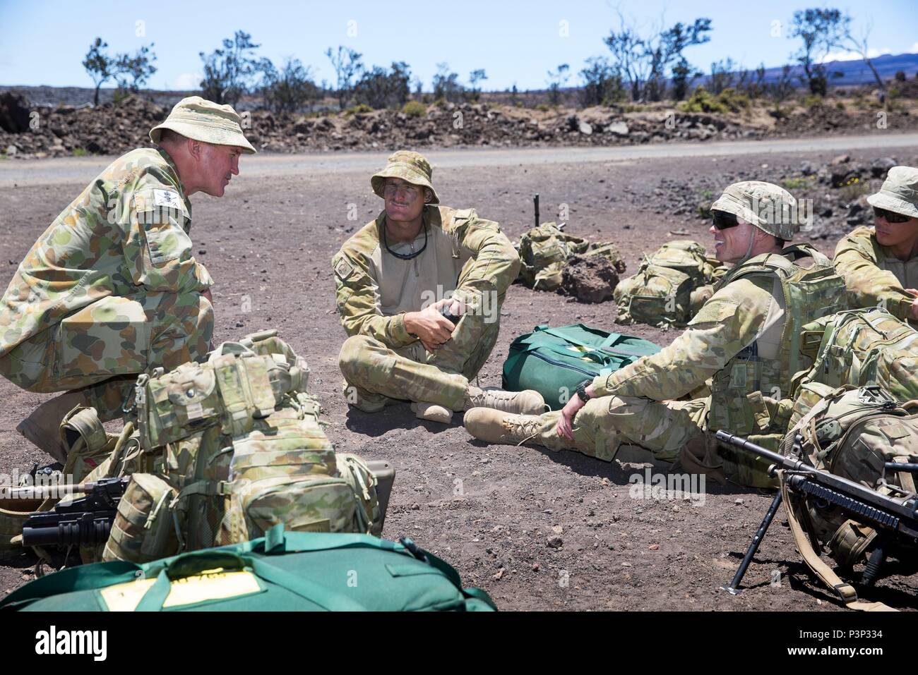 Australian Army officer Brigadier Christopher Field (left), CSC, Commander  of 3rd Brigade, chats with Australian Army