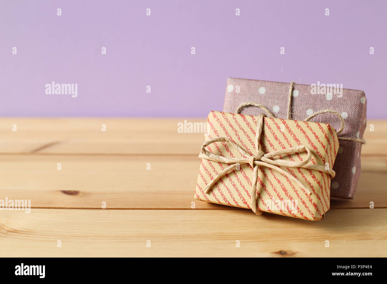 Gift boxes on wooden table Stock Photo