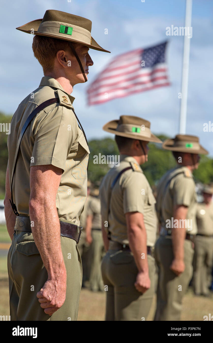 Australian Army officer Lieutenant Lachlan McAuliffe from The 2nd  Battalion, Royal Australian Regiment, at attention during the Samichon  Memorial Service on Exercise Rim of the Pacific 2016, Marine Corps Base  Hawaii. (Australian