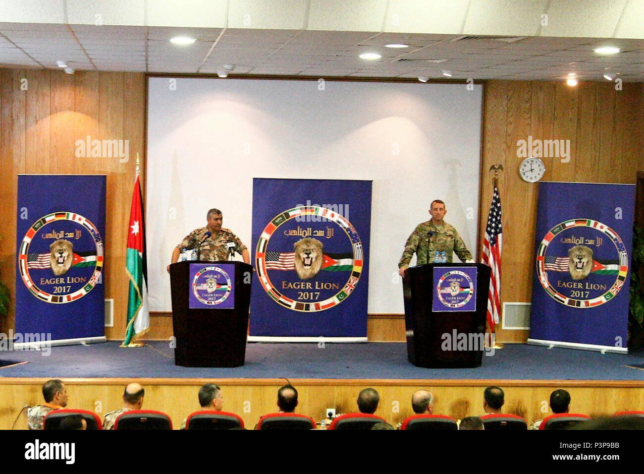 Maj.  Gen. William B. Hickman, deputy commanding general of the operations for the 3rd Army /Army Central Command and  Brig. Gen. Khaled Al-Shar'ah, director of Jordan-Arab Armed Forces Joint-Training Directorate answer questions during a press conference about Exercise Eager Lion 17 at the Jordanian Special Operations Command, outside Amman, Jordan, May 7, 2017. Eager Lion is an annual U.S. Central Command exercise in Jordan designed to strengthen military-to-military relationships between the U.S., Jordan and other international partners. This year's iteration is comprised of more than 7,000 Stock Photo