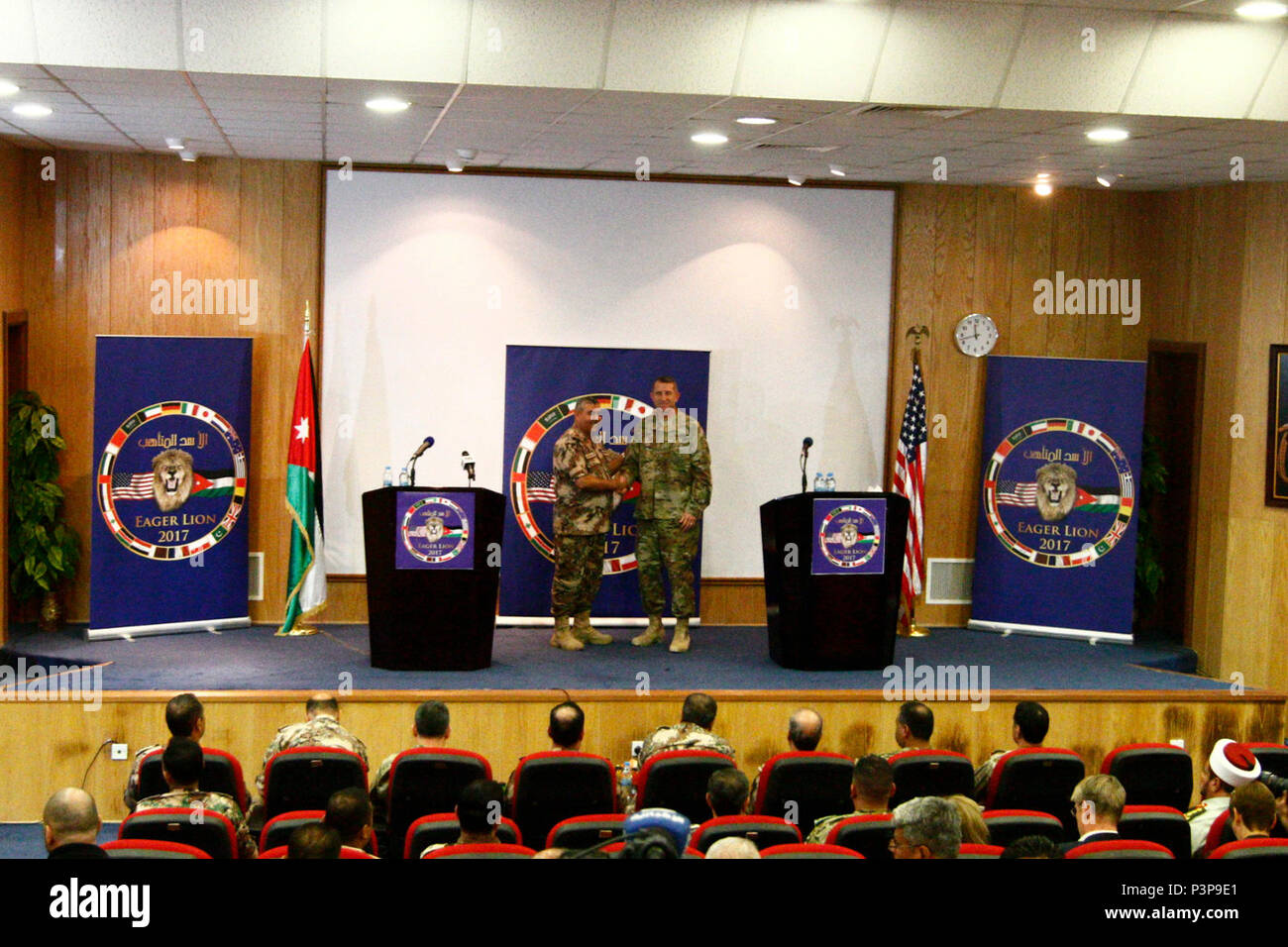 Maj.  Gen. William B. Hickman, deputy commanding general of the operations for the 3rd Army /Army Central Command and  Brig. Gen. Khaled Al-Shar'ah, director of Jordan-Arab Armed Forces Joint-Training Directorate answer questions during a press conference about Exercise Eager Lion 17 at the Jordan Special Operations Command, outside Amman, Jordan, May 7, 2017. Eager Lion is an annual U.S. Central Command exercise in Jordan designed to strengthen military-to-military relationships between the U.S., Jordan and other international partners. This year's iteration is comprised of more than 7,000 mi Stock Photo
