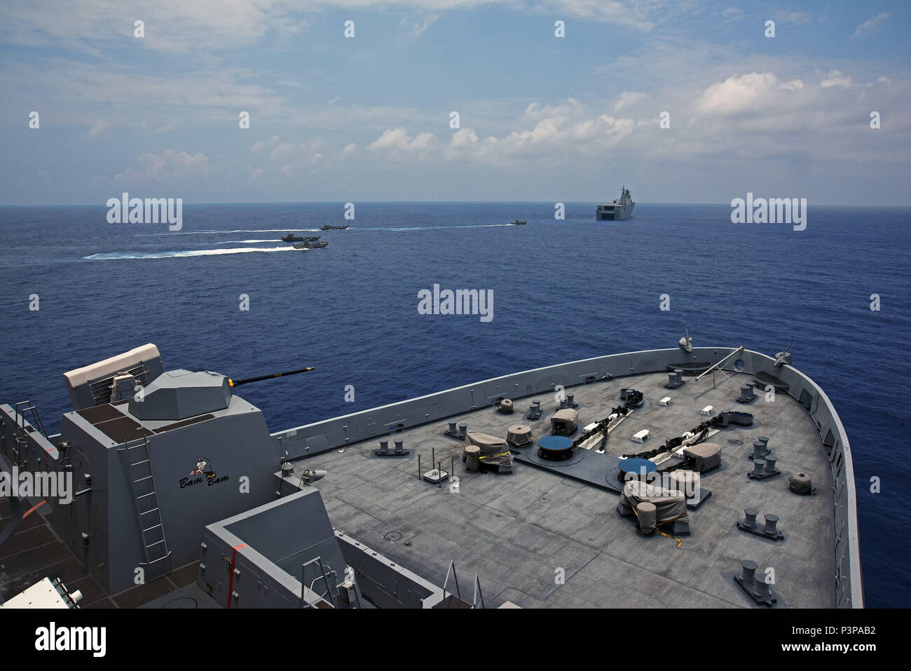 160718-N-RC734-315  PACIFIC OCEAN (July 18, 2016) - The Royal Australian Navy Canberra class amphibious ship HMAS Canberra (L02) and a group of LHD Landing Craft  transit the Pacific Ocean ahead of amphibious transport dock ship USS San Diego (LPD 22) during Rim of the Pacific 2016. Twenty-six nations, more than 40 ships and submarines, more than 200 aircraft and 25,000 personnel are participating in RIMPAC from June 30 to Aug. 4, in and around the Hawaiian Islands and Southern California. The world's largest international maritime exercise, RIMPAC provides a unique training opportunity that h Stock Photo