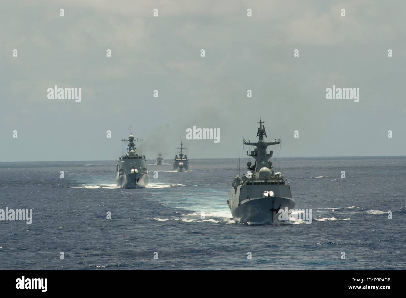 160713-N-OL837-175 PACIFIC OCEAN (July 13, 2016) Chinese Navy ships guided-missile frigate Hengshui (572) and guided-missile destroyer Xian (153), French Navy Floréal-class frigate FS Prairial (F 731) and Republic of Indonesia Navy Diponegoro-class corvette KRI Diponegoro (365) steam in formation as part of a replenishment-at-sea approach exercise during Rim of the Pacific 2016. Twenty-six nations, more than 40 ships and submarines, more than 200 aircraft, and 25,000 personnel are participating in RIMPAC from June 30 to Aug. 4, in and around the Hawaiian Islands and Southern California. The wo Stock Photo