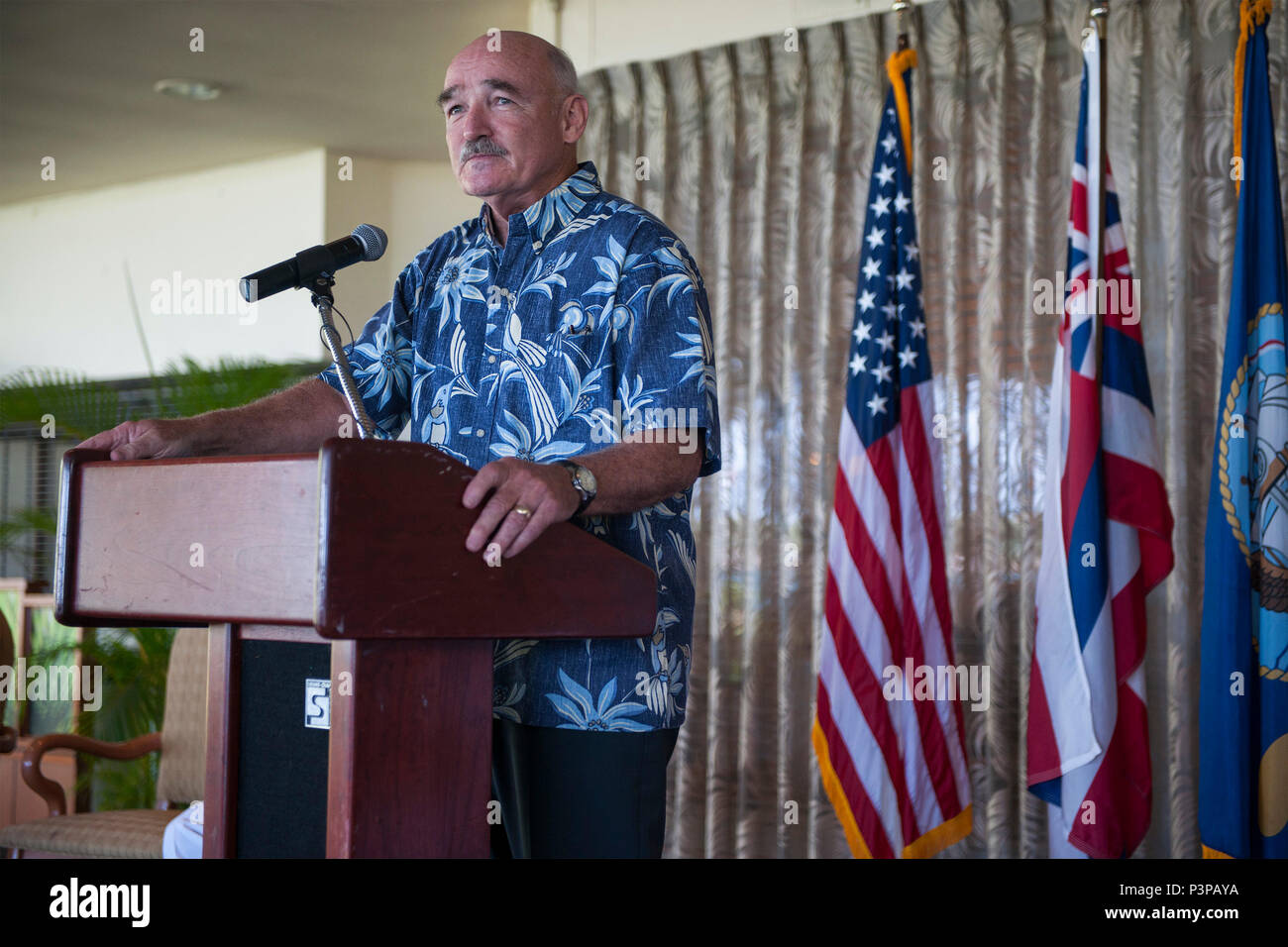 160721-N-AV234-140 PEARL HABOR (July 21, 2016) Assistant Secretary of the Navy (Energy, Installations and Environment) Dennis V. McGinn speaks at Historic Hickam Officers’ Club at Joint Base Pearl Harbor-Hickam during a lease signing ceremony between the Depart of the Navy and Hawaii Electric Company.  The DON and Hawaii Electric Company are developing a solar facility on JBPHH. The project will enable the DON to meet critical energy and security goals as well as further Hawaiian Electric’s commitment to renewable energy to the state. (U.S Navy Photo by Mass Communications Specialist 2nd Class Stock Photo