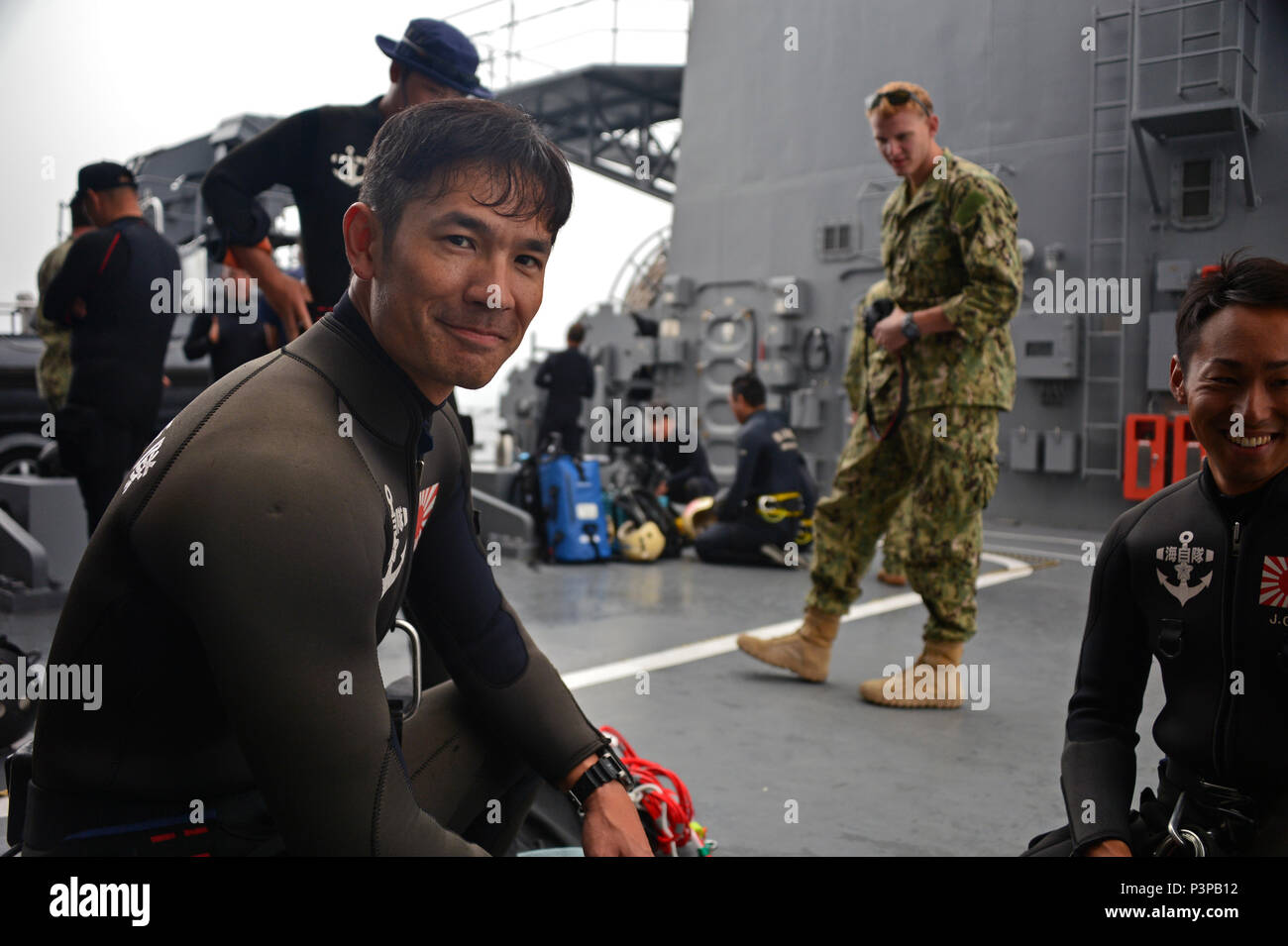us.jc.js A member of the Japan Maritime Self Defense Force (JMSDF) Explosive  Ordnance Disposal unit prepares his dive gear before a HRST Cast operation  aboard the JS Bungo during the 2JA 2016 Mine
