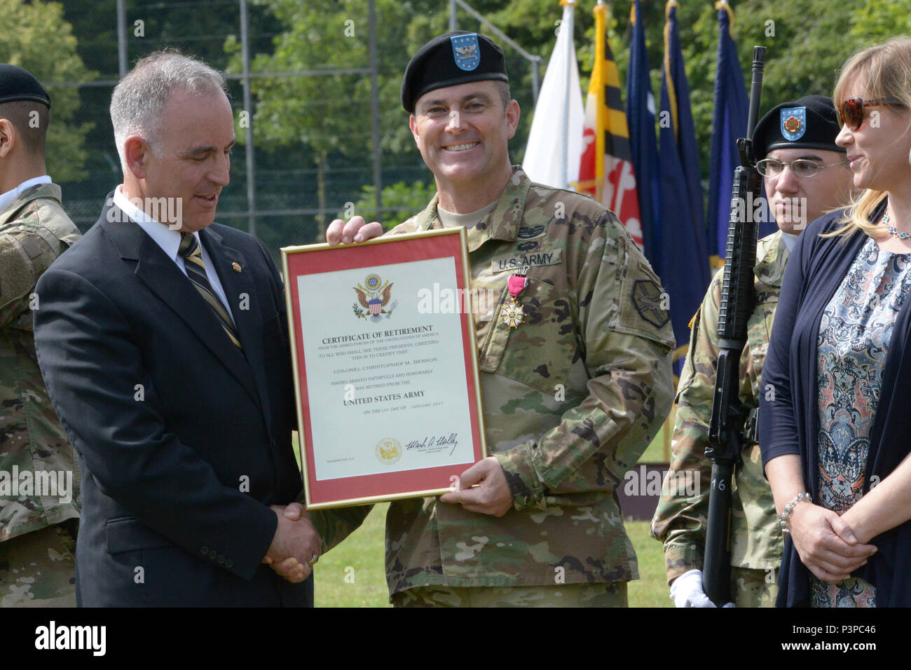ANSBACH, Germany (July 21, 2016) – Michael D. Formica, director of Installation Management Command – Europe, thanks Col. Christopher M. Benson, outgoing commander of U.S. Army Garrison Ansbach, for Benson’s service and performance. Benson’s retirement ceremony followed the USAG Ansbach change of command Monday at Barton Barracks here.. Stock Photo