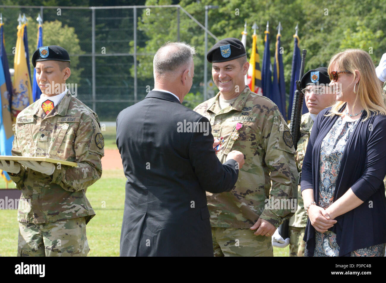 ANSBACH, Germany (July 21, 2016) – Michael D. Formica, director of Installation Management Command – Europe, thanks Col. Christopher M. Benson, outgoing commander of U.S. Army Garrison Ansbach, for Benson’s service and performance. Benson’s retirement ceremony followed the USAG Ansbach change of command Monday at Barton Barracks here. Stock Photo