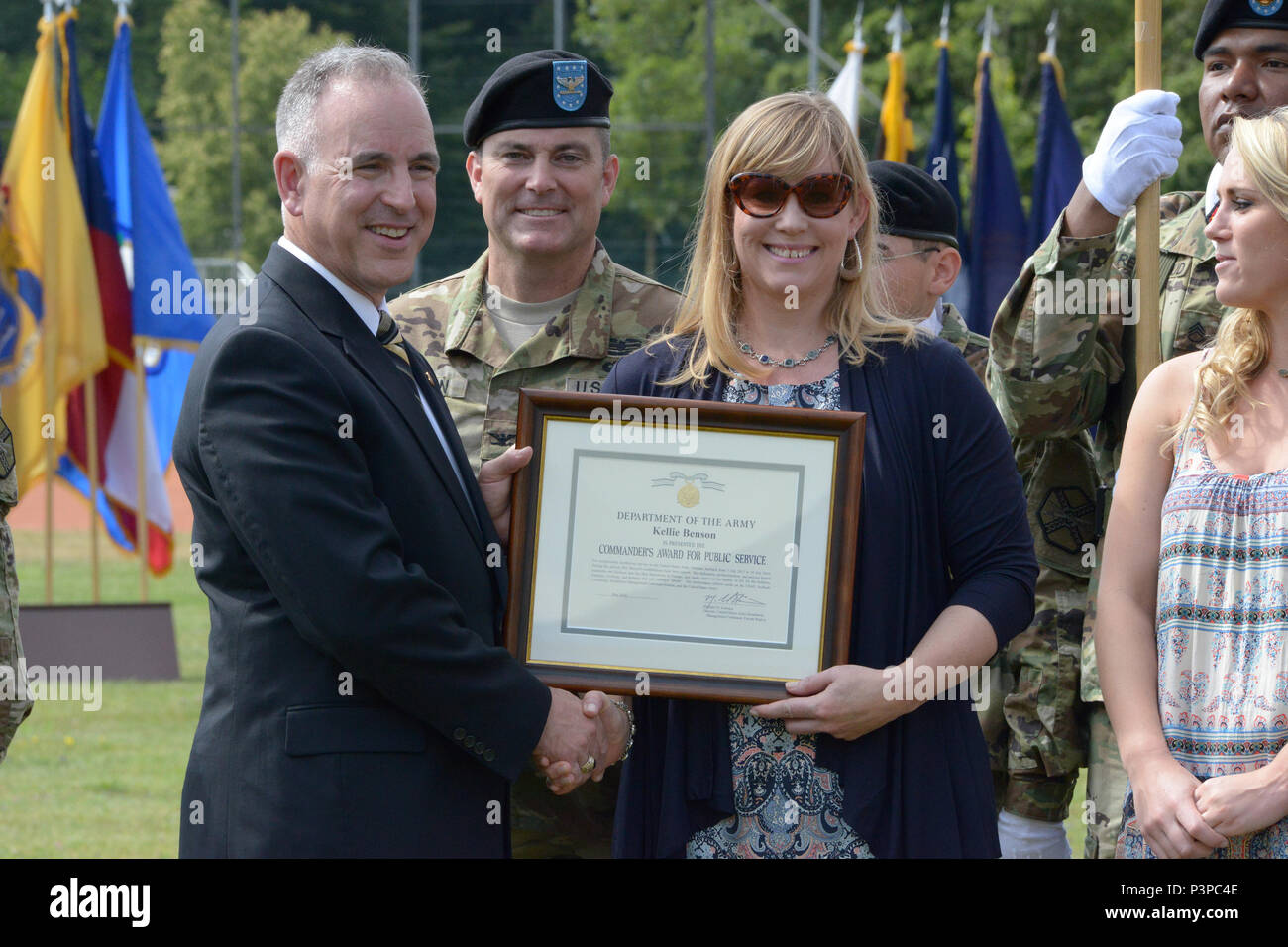 ANSBACH, Germany (July 21, 2016) – Michael D. Formica, director of Installation Management Command – Europe, thanks Kelly Benson, wife of outgoing U.S. Army Garrison Ansbach commander Col. Christopher M. Benson, during the garrison’s change of command ceremony Monday at Barton Barracks here.. Stock Photo