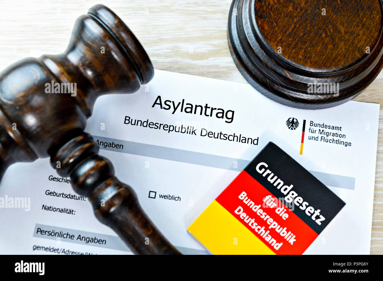 Asylum application, asylum procedures and the judges hammer, Asylantrag und Richterhammer, Asylverfahren Stock Photo