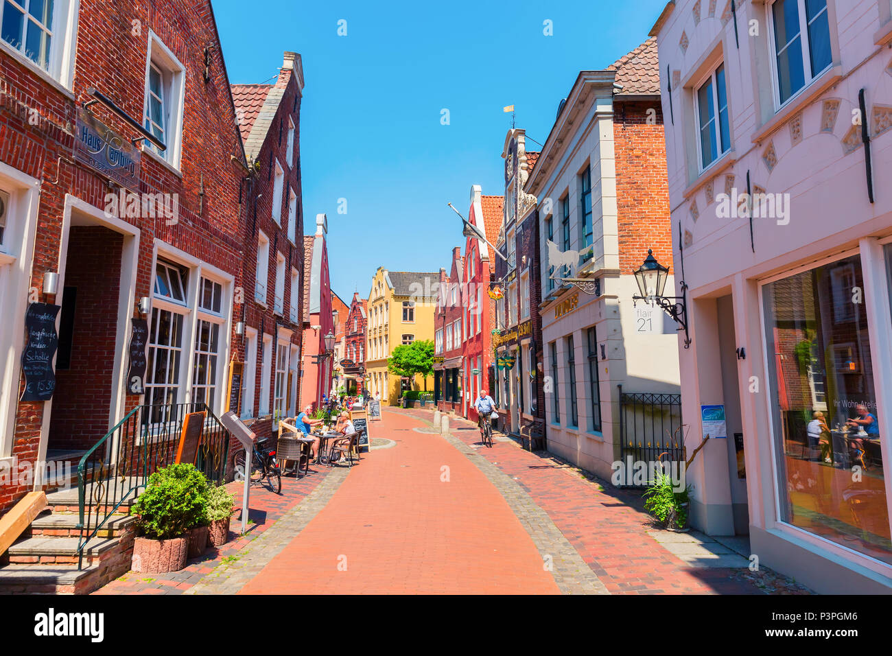Leer, Germany â€“ May 20, 2018: old town of Leer with unidentified people. Leer, named as the gate of Ostfriesland, has a big amount of historic build Stock Photo
