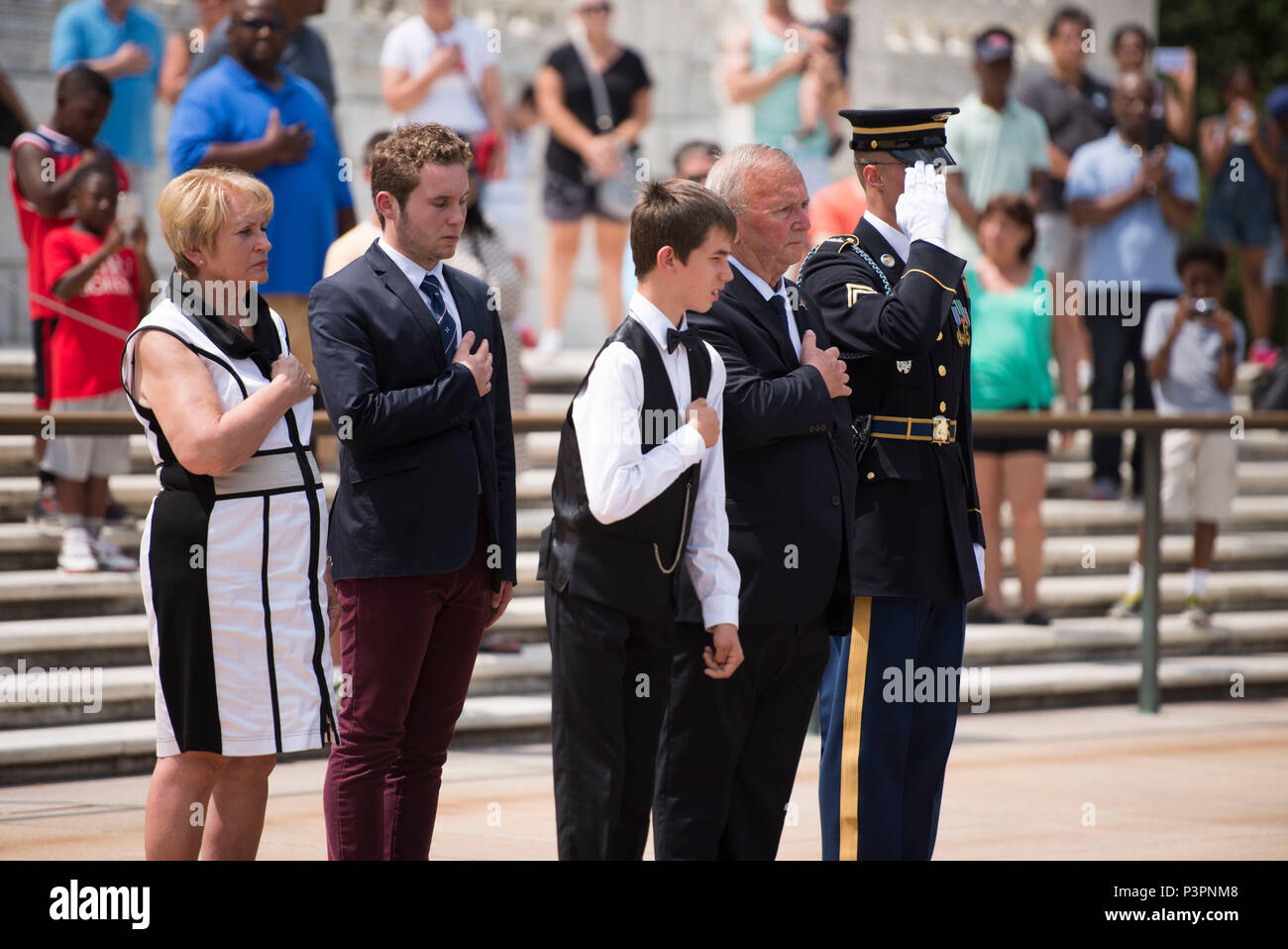 Jean-Marc Lefranc, fourth from the left, president of the Comité du  Débarquement ("Landing Committee"), and his family lay a wreath at the Tomb  of the Unknown Soldier in Arlington National Cemetery, July