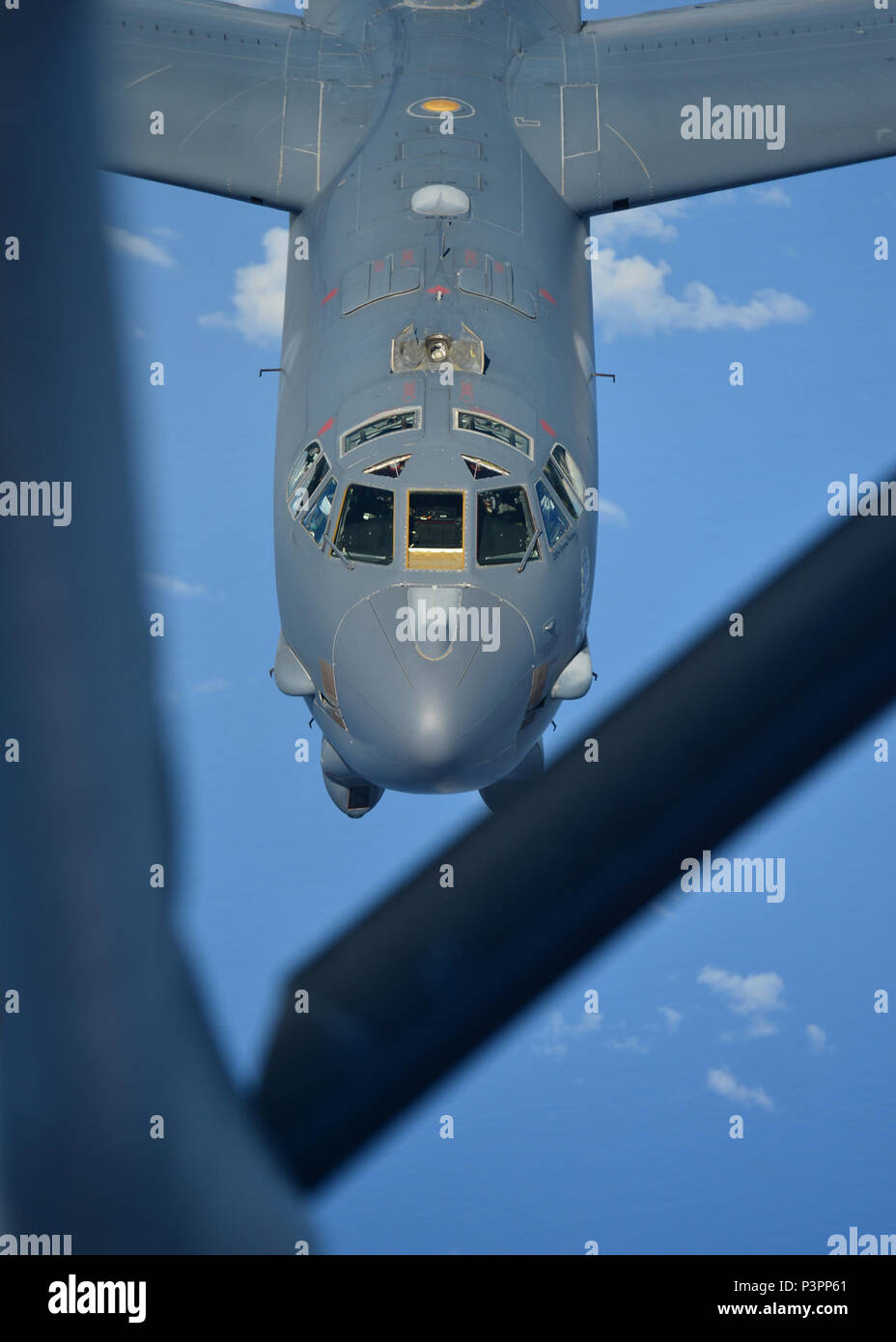 A B-52H Stratofortress from the 69th Bomb Squadron, Minot Air Force Base, N.D., prepares to receive fuel from a KC-135 Stratotanker, over the Pacific Ocean during an international sinking exercise for Rim of the Pacific 2016 near Joint Base Pearl Harbor-Hickam, July 14, 2016. Twenty-six nations, more than 40 ships and submarines, more than 200 aircraft, and 25,000 personnel are participating in RIMPAC from June 30 to Aug. 4 in and around the Hawaiian Islands and Southern California. The world's largest international maritime exercise, RIMPAC, provides a unique training opportunity that helps p Stock Photo