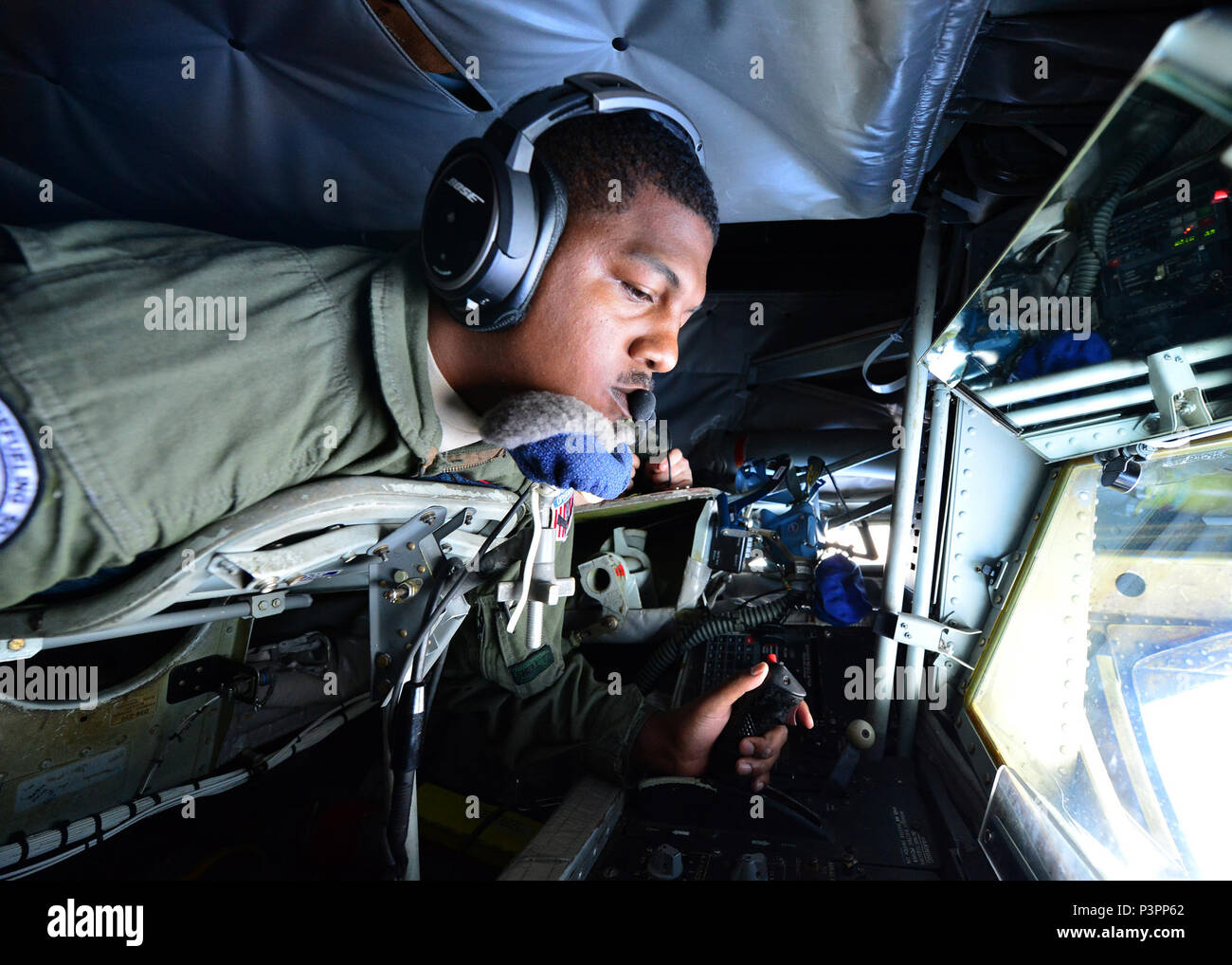 U.S. Air Force Senior Airman Cory Drummond, a 909th Aircraft Refueling Squadron boom operator, refuels a B-52H Stratofortress assigned to the 69th Bomb Squadron, Minot Air Force Base, N.D., over the Pacific Ocean during an international sinking exercise for Rim of the Pacific 2016 near Joint Base Pearl Harbor-Hickam, July 14, 2016. Twenty-six nations, more than 40 ships and submarines, more than 200 aircraft, and 25,000 personnel are participating in RIMPAC from June 30 to Aug. 4 in and around the Hawaiian Islands and Southern California. The world's largest international maritime exercise, RI Stock Photo