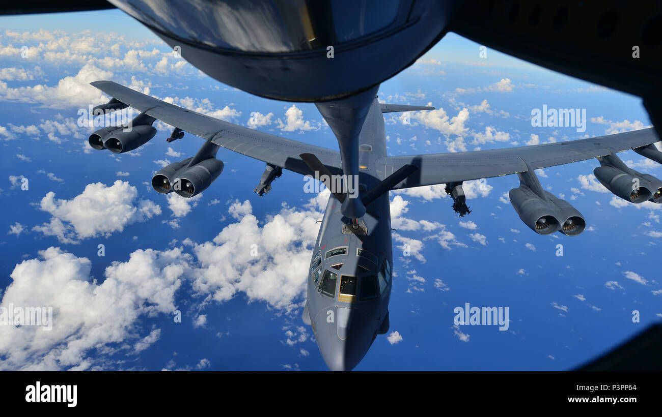 A B-52H Stratofortress assigned to the 69th Bomb Squadron, Minot Air Force Base, N.D., prepares to receive fuel from a KC-135 Stratotanker over the Pacific Ocean during an international sinking exercise for Rim of the Pacific 2016 near Joint Base Pearl Harbor-Hickam, July 14, 2016. Twenty-six nations, more than 40 ships and submarines, more than 200 aircraft, and 25,000 personnel are participating in RIMPAC from June 30 to Aug. 4 in and around the Hawaiian Islands and Southern California. The world's largest international maritime exercise, RIMPAC, provides a unique training opportunity that h Stock Photo