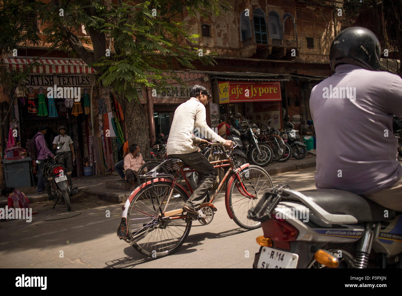 Men, bicycle, street, India Stock Photo