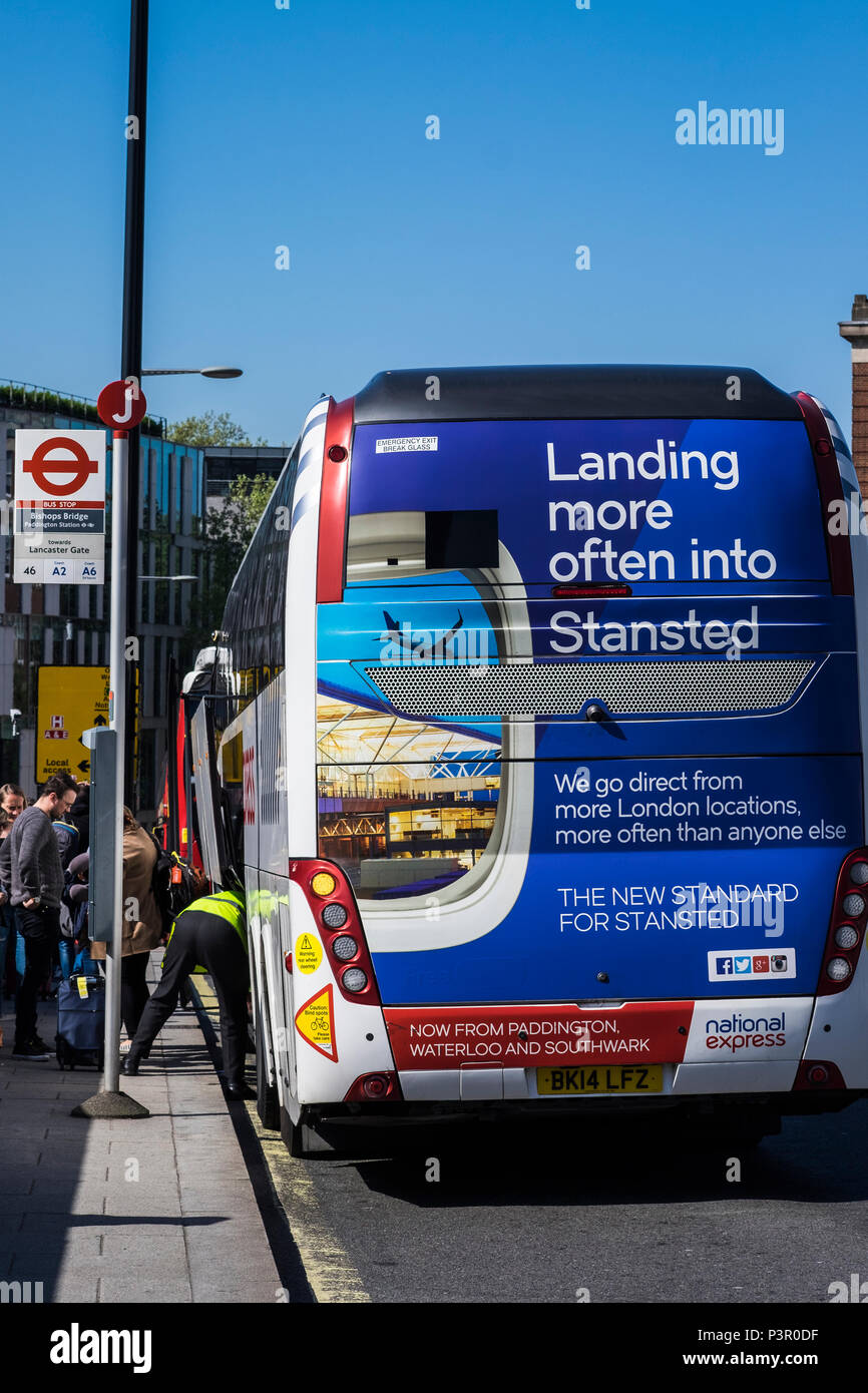 National Express coach picking up passengers at Paddington on route to  Stanstead Airport, London, England, U.K Stock Photo - Alamy