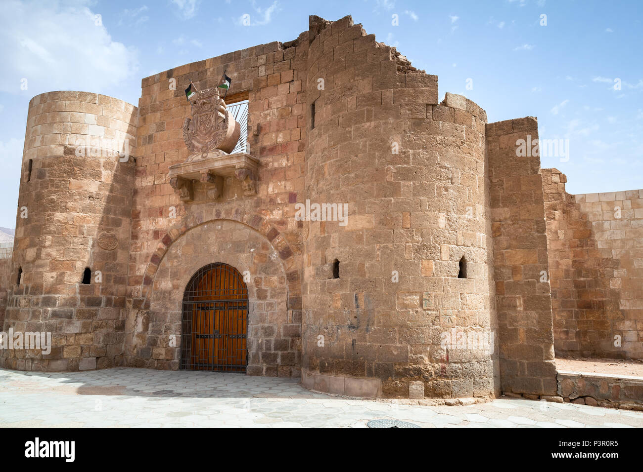 Main entrance gate of Aqaba Fortress, Mamluk Castle or Aqaba Fort located in Aqaba city, Jordan Stock Photo