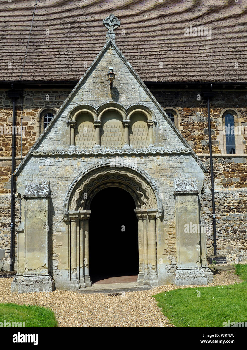 The porch of the fine Norman church in the West Norfolk village of ...