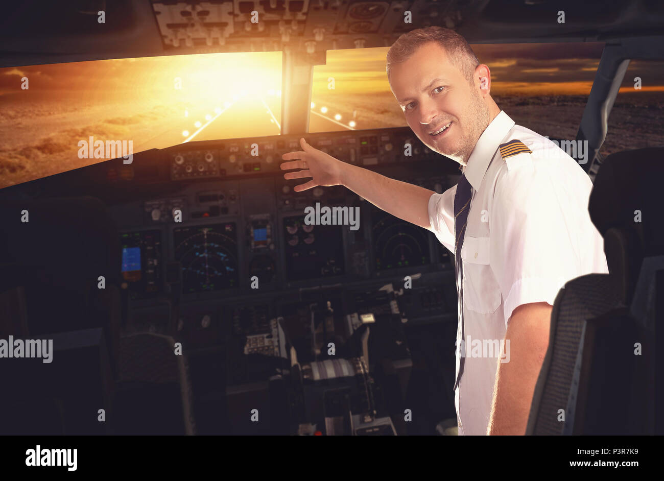 landing and smiling pilot of the plane Stock Photo