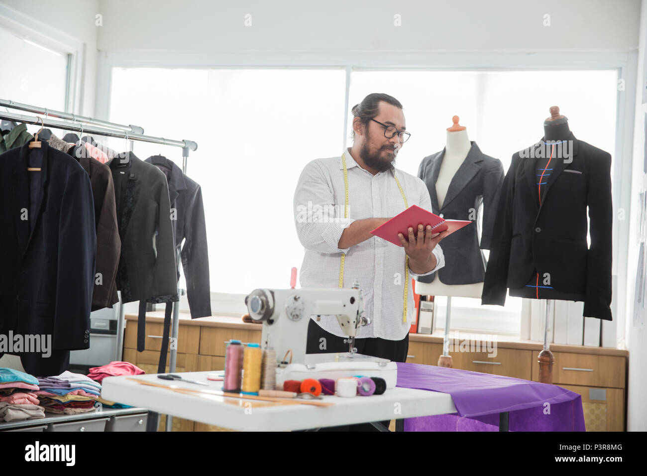 male tailor in his workshop Stock Photo