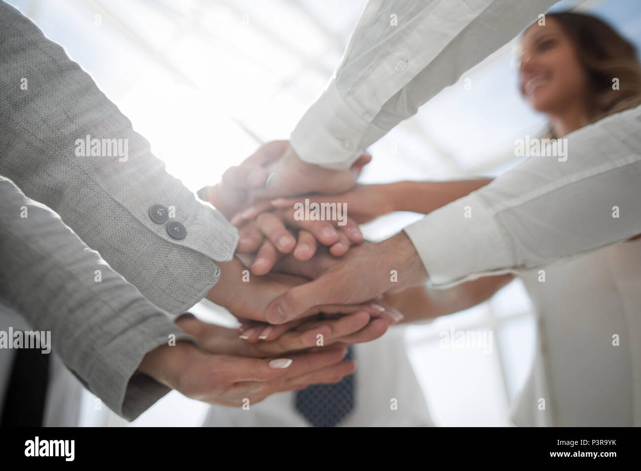 close up.hand stack on blurred background Stock Photo - Alamy