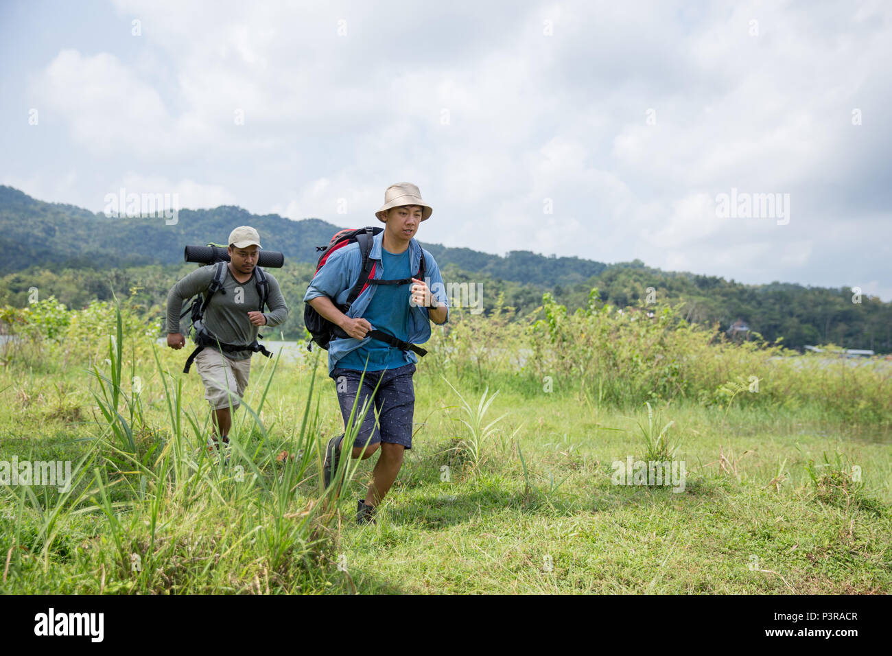Young adventure hikers trekking lake hi-res stock photography and ...