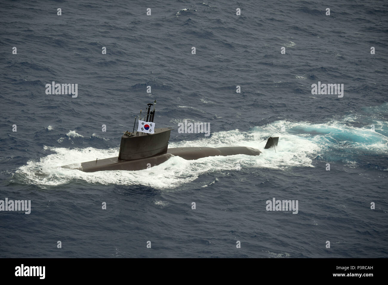 160728-N-SI773-3273 PACIFIC OCEAN (July 28, 2016) Republic of Korea Chang Bogo-class submarine ROKS Lee Eokgi (SS 071) transits in close formation as one of 40 ships and submarines representing 13 international partner nations during Rim of the Pacific 2016. Twenty-six nations, more than 40 ships and submarines, more than 200 aircraft, and 25,000 personnel are participating in RIMPAC from June 30 to Aug. 4, in and around the Hawaiian Islands and Southern California. The world's largest international maritime exercise, RIMPAC provides a unique training opportunity that helps participants foster Stock Photo