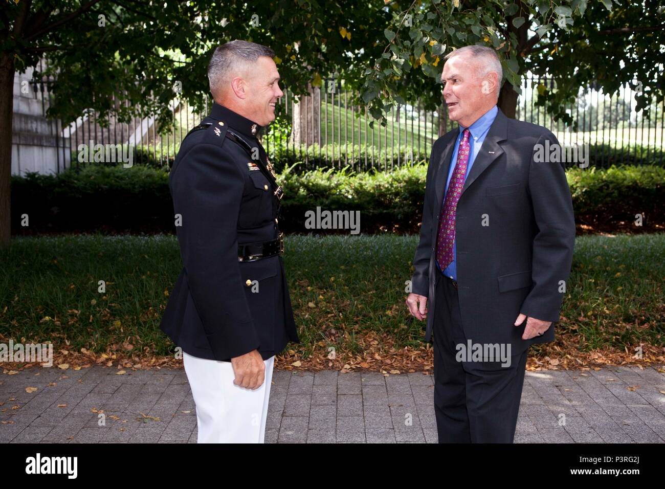 U.S. Marine Corps Maj. Gen. John Ewers, left, staff judge advocate to