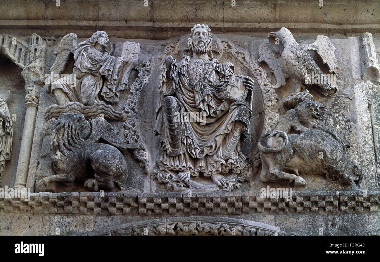 EXTERIOR-FRISO SIGLO XII (1175-1180)-DETALLE DEL  PANTOCRATOR Y SIMBOLOS DE LOS EVANGELISTAS. Location: IGLESIA DE SANTIAGO, CARRION DE LOS CONDES, PALENCIA, SPAIN. Stock Photo