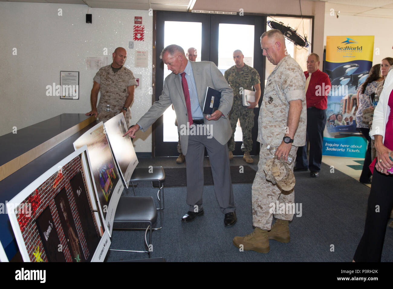 Lee Farmer, Marine Corps Community Services Assitant Chief of Staff, Marine Corps Installations West, deatails the progress of the Marine Corps Logistics Base Barstow bowling alley to BGen. Kevin Killea, Commanding General of Marine Corps Installations West – Marine Corps Base Camp Pendleton, July 25, 2016. BGen. Killea’s tour included visits to the installation’s Marine Corps Community Services facilities, Marine Depot Maintenance Center, and Fleet Support Division.  (U.S. Marine Corps photo by Carlos Guerra, MCLBB Combat Camera/Released) Stock Photo