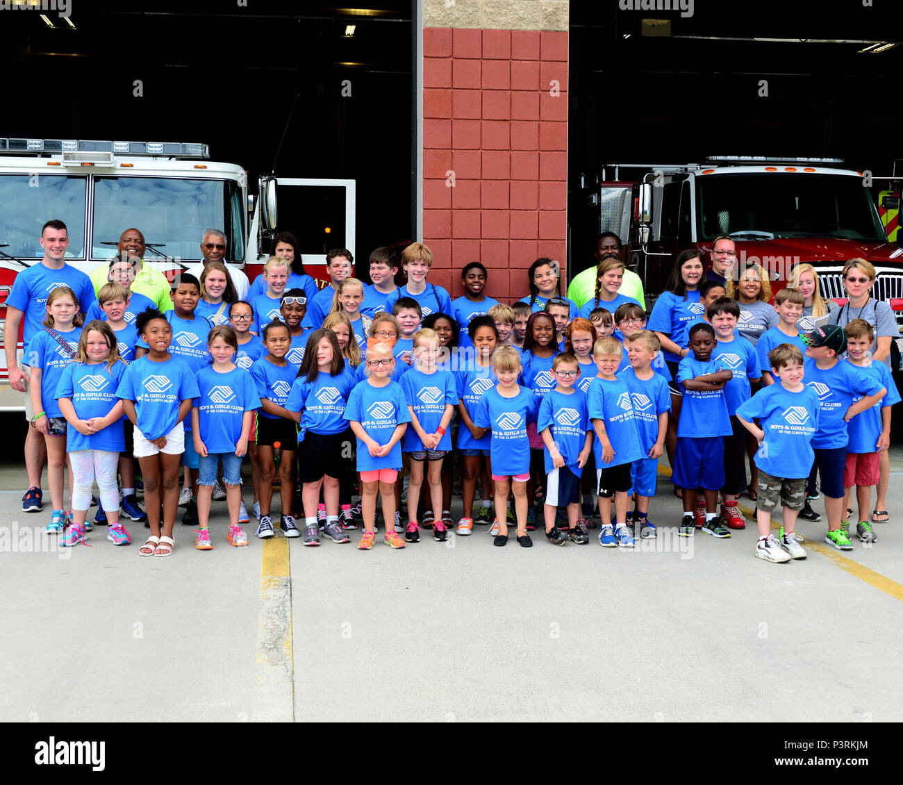 The Boys and Girls Club of Clinch Valley, Roane County Unit, pose for a group photo during a tour of the 134th Air Refueling Wing fire department July 26, 2016 at McGhee Tyson Air National Guard Base, Knoxville, Tenn. (U.S. Air National Guard photo by Daniel Gagnon) Stock Photo