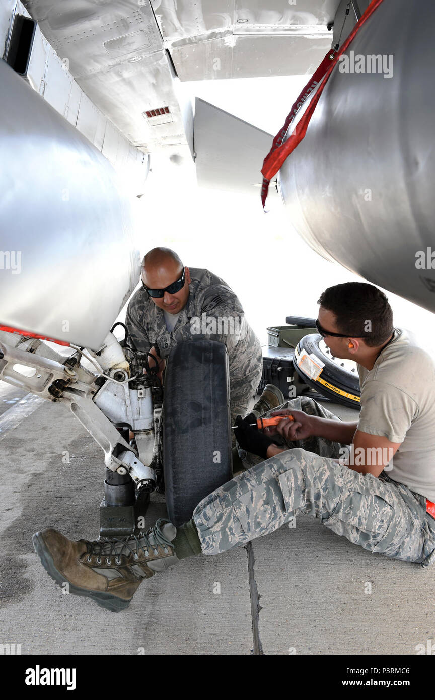 Staff Sgts. Kris Quinonez (left) and Matthew Sanchez, crew chiefs assigned to the 149th Fighter Wing, Air National Guard, change a tire during Coronet Cactus at Davis-Monthan Air Force Base, Ariz., May 8, 2017. Coronet Cactus is an annual training event that takes members of the 149th Fighter Wing, headquartered at Joint Base San Antonio-Lackland, Texas, to Tucson, Arizona to participate in a deployment exercise. (Air National Guard Stock Photo