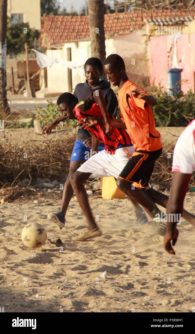 Boys paying football, St Louis, Senegal Stock Photo