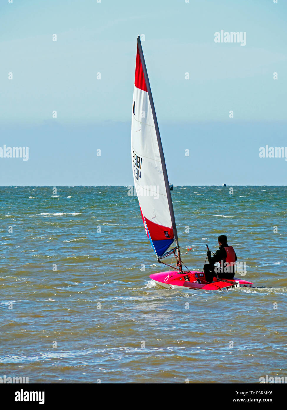 dinghy-sailing-from-snettisham-beach-in-west-norfolk-home-of