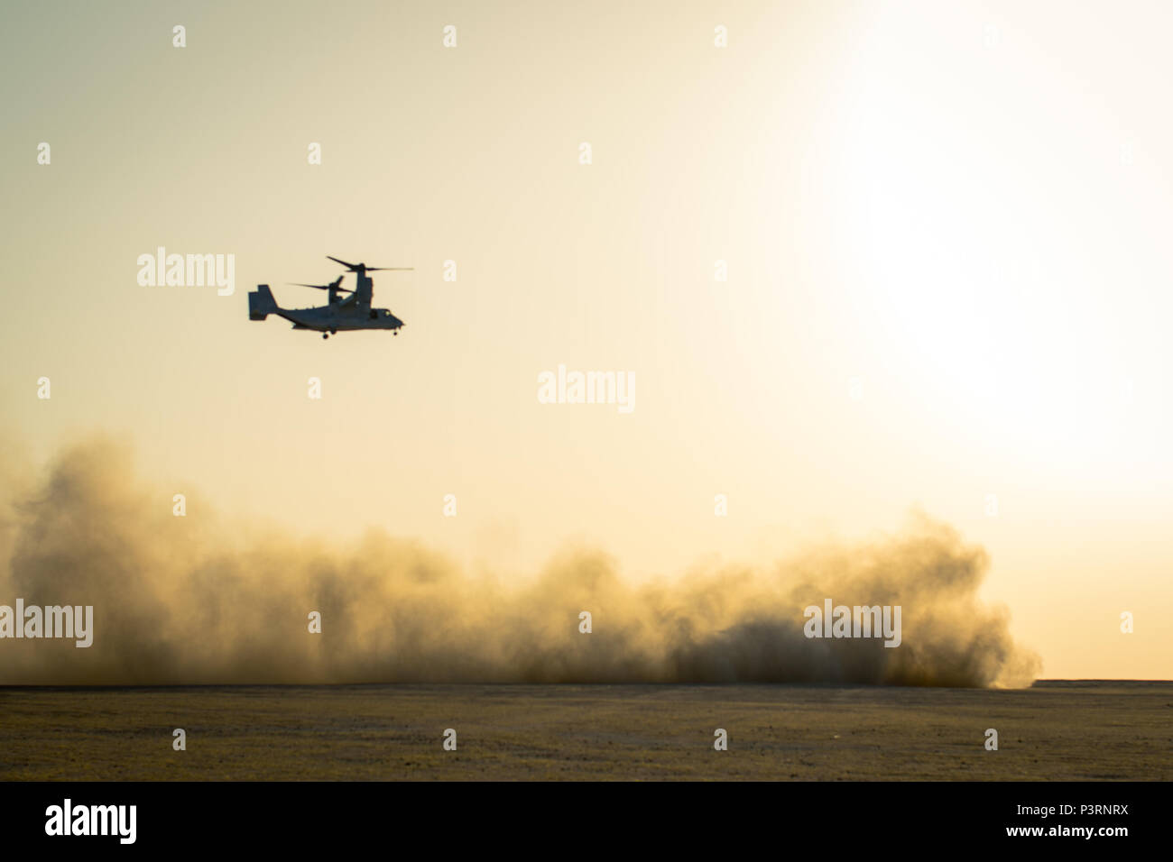 An MV-22 Osprey with Marine Medium Tiltrotor Squadron-363, Special Purpose Marine Air Ground Task Force - Crisis Response - Central Command prepares to land during a Tactical Recovery of Aircraft and Personnel exercise, July 18, 2016. SPMAGTF – CR – CC is a self-sustaining expeditionary unit, designed to provide a broad range of crisis response capabilities throughout the Central Command area of responsibility, using organic aviation, logistical, and ground combat assets, to include TRAP and embassy reinforcement. (U.S. Marine Corps photo by Cpl. Trever Statz/Released) Stock Photo