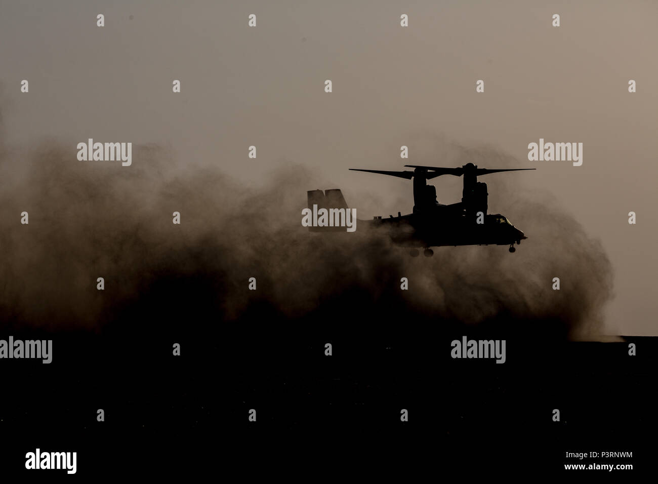 An MV-22 Osprey with Marine Medium Tiltrotor Squadron-373, Special Purpose Marine Air Ground Task Force - Crisis Response - Central Command, prepares to land during a Tactical Recovery of Aircraft and Personnel exercise, July 18, 2016. SPMAGTF – CR – CC is a self-sustaining expeditionary unit, designed to provide a broad range of crisis response capabilities throughout the Central Command area of responsibility, using organic aviation, logistical, and ground combat assets, to include TRAP and embassy reinforcement. (U.S. Marine Corps photo by Cpl. Trever Statz/Released) Stock Photo