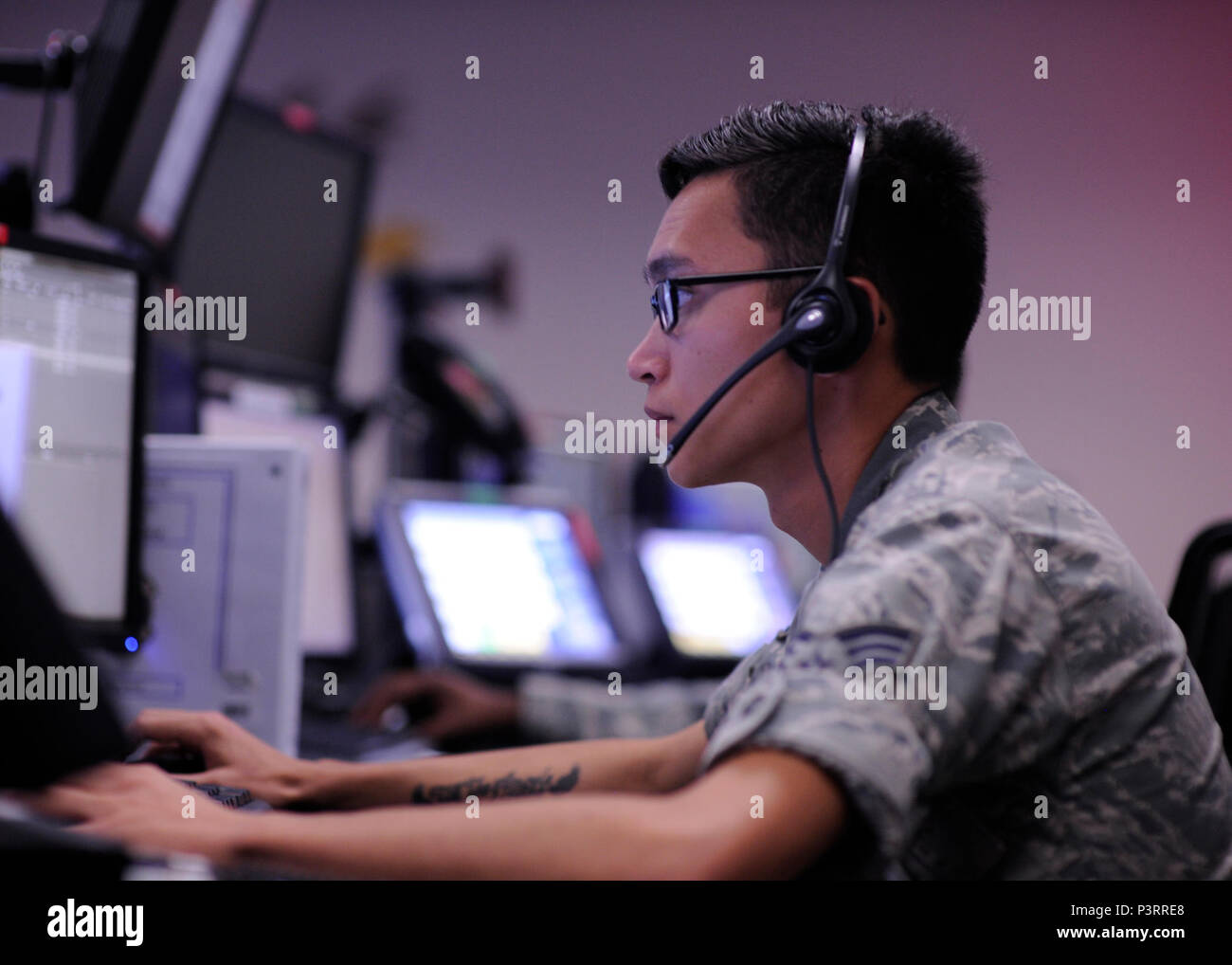 Senior Airman Dakota Rimbach from the 81st Range Control Squadron runs a command and control mission at the 81st RCS, Tyndall Air Force Base, Fla., July 26,2016. The 81st RCS provides command and control in support of the 53rd Weapons Evaluation Group mission. (U.S. Air Force photo by Senior Airman Solomon Cook/Released) Stock Photo