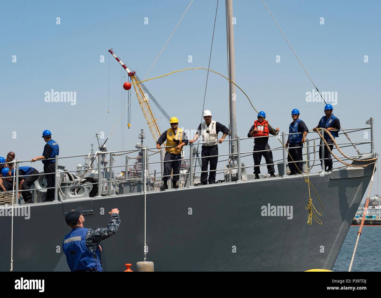 NAVAL BASE SAN DIEGO (July 29, 2016) Sailors assigned to Mine Countermeasures Ship USS Champion (MCM 4) moor the ship after participating in the Southern California portion of Rim of the Pacific 2016. Twenty-six nations, more than 40 ships and submarines, more than 200 aircraft and 25,000 personnel are participating in RIMPAC from June 30 to Aug. 4, in and around the Hawaiian Islands and Southern California. The world's largest international maritime exercise, RIMPAC provides a unique training opportunity that helps participants foster and sustain the cooperative relationships that are critica Stock Photo