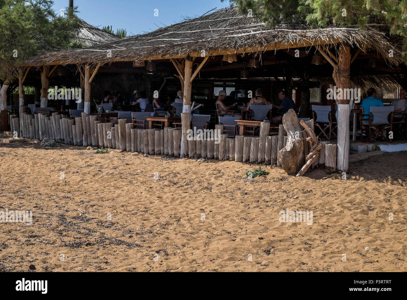 Beach side bar and restaurant on Assos Greece Stock Photo Alamy