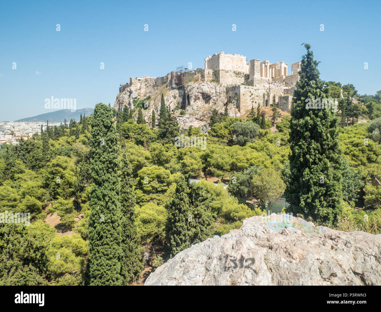 View from the solid marble hill called Aeropagus Hill aka Mars Hill, towards the Acropolis, Athens, Greece Stock Photo