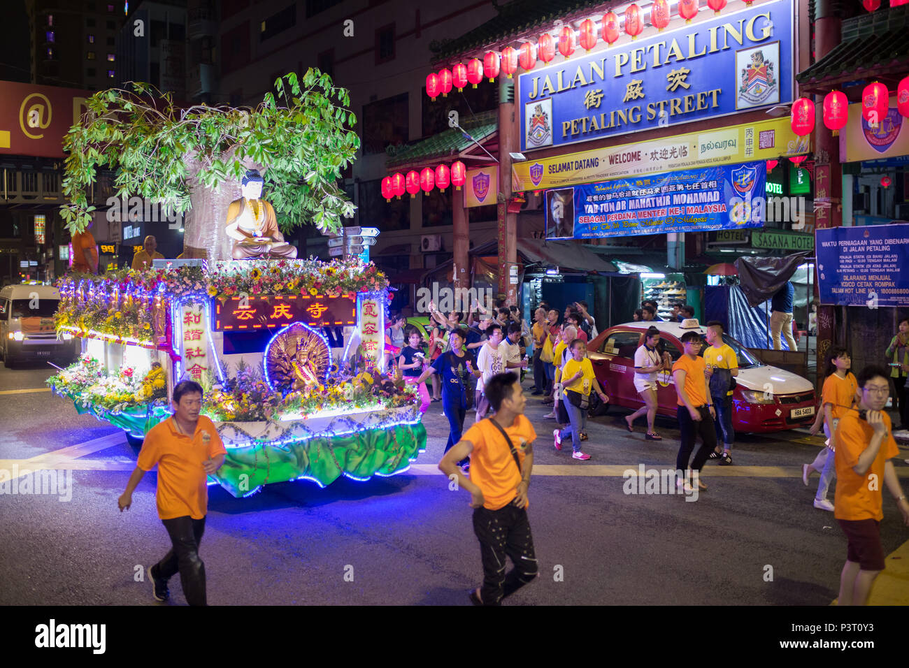 Wesak procession floats vehicles and buddhist pilgrims Passing through Tun Tan cheng Lock road, Chinatown Kuala Lumpur, Malaysia during wesak day, 29t Stock Photo